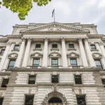 What the Budget Could Mean for Your Money: Six Big Tax and Finance Changes to Watch 8 Historic building with classical architecture.