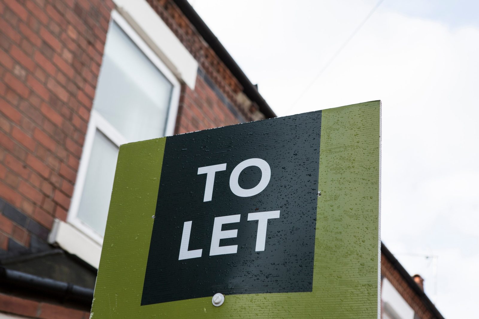 Property Income Efficiency Report 1 UK To Let rental property sign outside a red brick house
